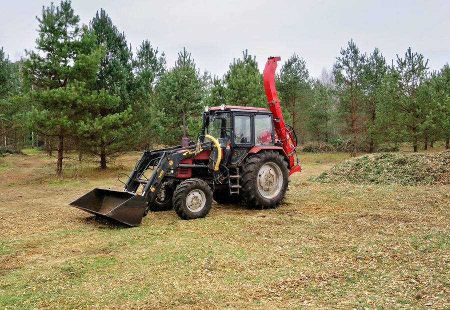 Forestry mulcher grinding standing hardwood brush into chips on Crowley's Ridge acreage